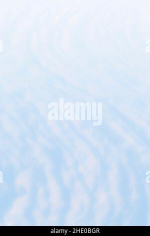 Smooth and blurred white and light blue snow in S-shape. Abstract high resolution full frame background, copy space. Stock Photo