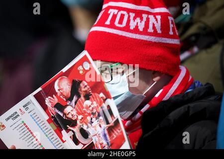 Young Swindon Town fans in the stands before the Emirates FA Cup third round match at the Energy Check County Ground, Swindon. Picture date: Friday January 7, 2022. Stock Photo