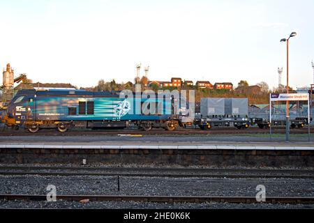 Direct Rail Services Class 88 diesel electric locomotive 'Evolution' waits with a freight train at Worcester Shrub Hill Station, England