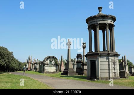 Man walking in Glasgow Necropolis Stock Photo