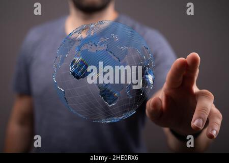 Male's hands holding an illustration of global network concept Stock Photo