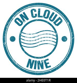 ON CLOUD NINE text written on blue round postal stamp sign Stock Photo