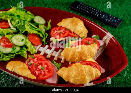 American football game concept. Catering fresh meal for fan of football game. Stock Photo