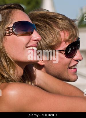Model couple  posing ,Beautiful couple wearing sunglasses Stock Photo