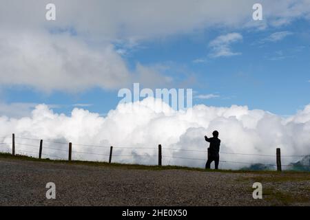 Fence with clouds in the background Stock Photo