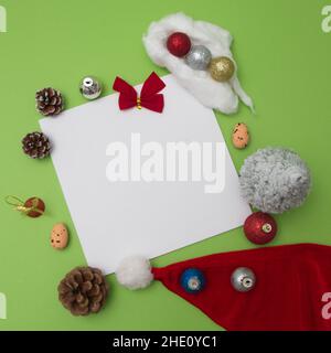Top view of pine cones and christmas decorations with a blank space in the middle Stock Photo