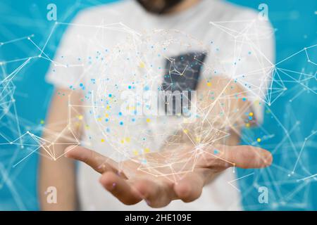 Male's hands holding an illustration of videoconference group of people talking on social network Stock Photo