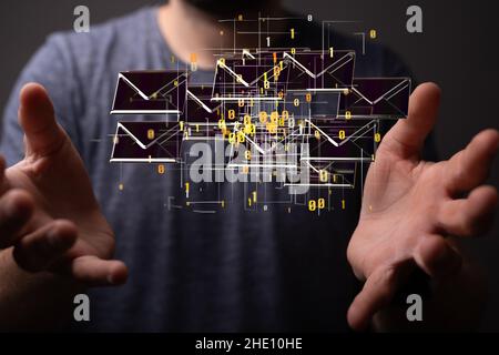 Male's hand pointing to an illustration of email inbox signs Stock Photo