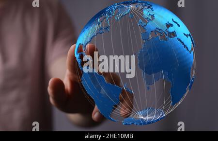 Male's hands holding an illustration of global network concept Stock Photo
