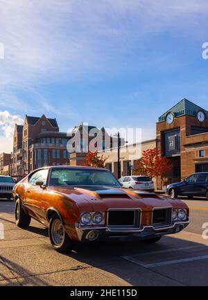 , Michigan, USA - October 24, 2021: A 1971 Oldsmobile 442 Cutlass Muscle  Car parked on Main Street Stock Photo