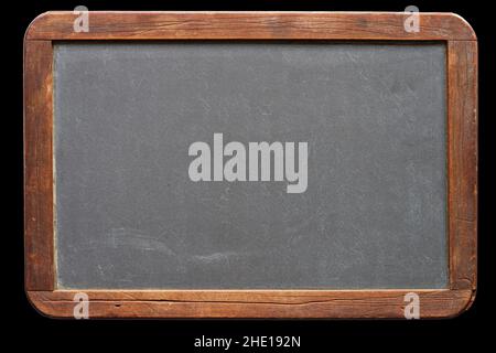 blank antique small blackboard with wood frame isolated on black background Stock Photo