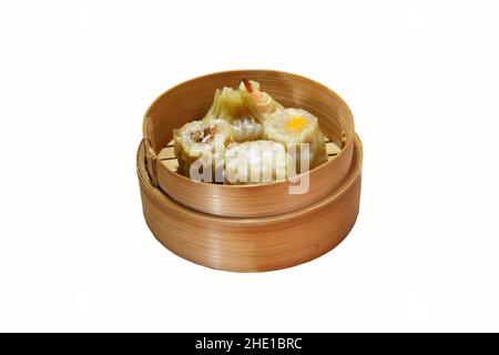 various types of dim sum in a bamboo container on a white background Stock Photo