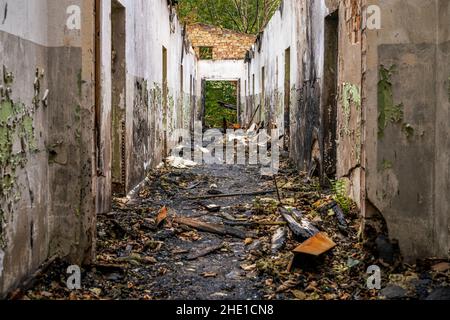 Sassnitz, Mecklenburg-Western Pomerania, Germany - October 02, 2020: Ruins of military barracks of the National People's Army of the former German Dem Stock Photo