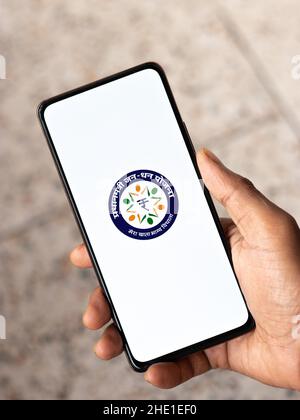 West Bangal, India - December 15, 2021 : Dhan logo on phone screen stock image. Stock Photo