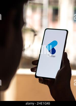 Assam, india - May 29, 2021 : Google Flutter logo on phone screen stock image. Stock Photo