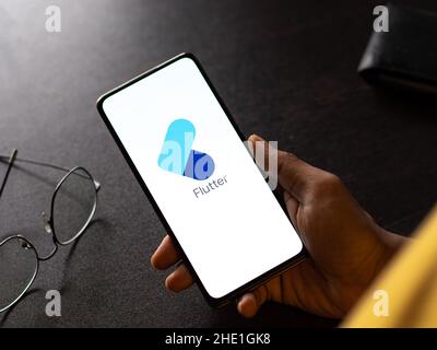 Assam, india - May 29, 2021 : Google Flutter logo on phone screen stock image. Stock Photo