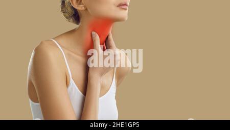 Banner background with young woman who has sore throat or problems with her thyroid gland Stock Photo