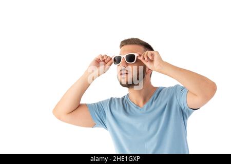 Surprised man looking up with a sunglasses on a white background Stock Photo