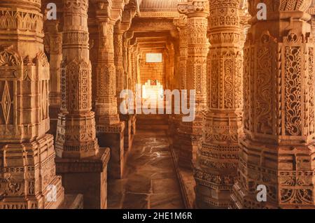 Bas-relief at columns at famous ancient Ranakpur Jain temple in Rajasthan state, India Stock Photo