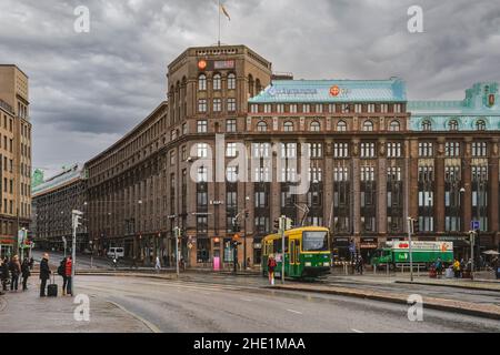 Helsinki, Finland - October 5, 2019 : Green tram transporting people in the central part of the Helsinki city, Finland Stock Photo