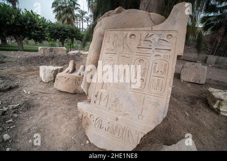 An ancient stone slab with egyptian hieroglyphs carved on it sits outside in Memphis, Egypt. Stock Photo