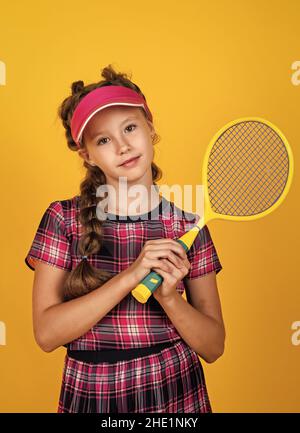 healthy sporty tween girl hold tennis racket, badminton Stock Photo