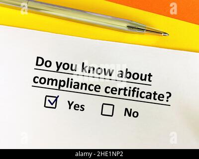 One person is answering question about banking. He knows about compliance certificate. Stock Photo