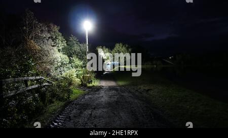 Llangennech train crash site, works site and paths created to the crash taken at night. Stock Photo