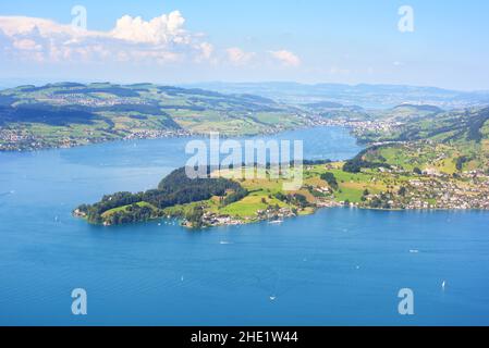 Lake and mountain landscape in central Switzerland, view of the Lake Lucerne and Lake Zug, Weggis village and Kussnacht am Rigi town Stock Photo