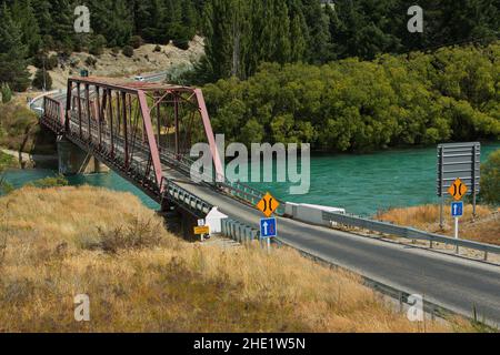 Red Bridge over Clutha River near Wanaka in Otago on South Island of New Zealand Stock Photo