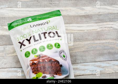 Plastic packet of the natural sucrose sugar alternative Xylitol. Used by weight watchers, diabetics, for healthier lifestyles, and keto diets. Stock Photo