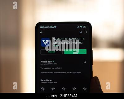 West Bangal, India - December 15, 2021 : Vested logo on phone screen stock image. Stock Photo