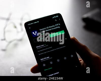 West Bangal, India - December 15, 2021 : Vested logo on phone screen stock image. Stock Photo