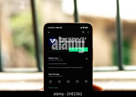 West Bangal, India - December 15, 2021 : Vested logo on phone screen stock image. Stock Photo