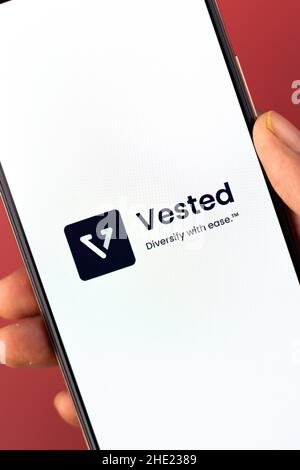 West Bangal, India - December 15, 2021 : Vested logo on phone screen stock image. Stock Photo