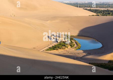 Crescent Moon Lake at Singing Sands Dune near Dunhuang, Gansu Province, China Stock Photo