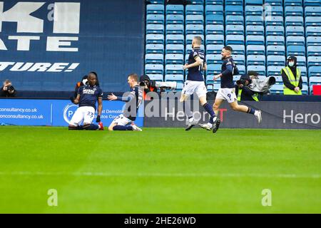London, UK. 8th Jan 2022, 8th January 2022: The Den, Millwall, London, England; FA Cup 3rd Round football, Millwall versus Crystal Palace: Benik Afobe of Millwall celebrates his goal with his team mates for 1-0 in 17th minute Credit: Action Plus Sports Images/Alamy Live News