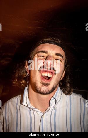 France, Brittany, Quevert, 2020-12-31. New Year's Eve party, or Saint-Sylvestre, of a group of young people during the Covid-19 crisis as France emerg Stock Photo