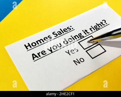 One person is answering question about homes sales. Stock Photo