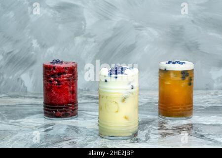 Cold drink in various flavors on a marble floor Stock Photo