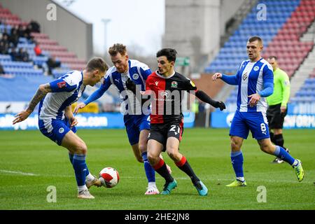 John Buckley #21 of Blackburn Rovers Under pressure fromAndy Rinomhota #35  of Cardiff City during the Sky Bet Championship match Cardiff City vs  Blackburn Rovers at Cardiff City Stadium, Cardiff, United Kingdom