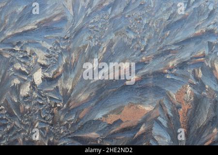 Ice Crystals on Glass. Abstract Ice design for background. Stock Photo