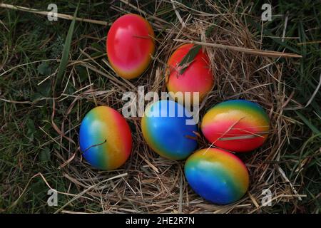 Easter traditions. Compositions with painted Easter eggs. Stock Photo