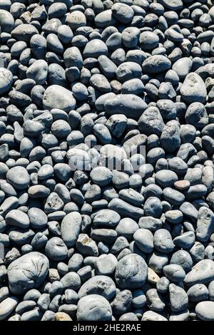 Close-up of rocky beach; Pacific Ocean; Oregon coast; near the Yaquina Lighthouse; Newport; Oregon, USA Stock Photo