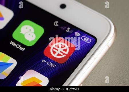 E-CNY and WeChat app icons are seen on a Xiaomi smartphone on Jan 7, 2022. E-CNY, China's digital yuan wallet app is now available in app stores. Stock Photo