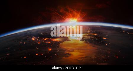 Sunrise reflected in the water, lights of night cities on the ground. Elements of this image furnished by NASA. Stock Photo