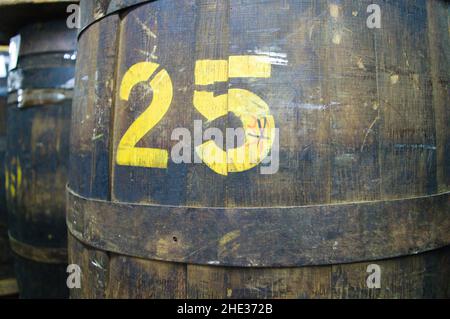 Wooden barrels in tobacco factory Stock Photo