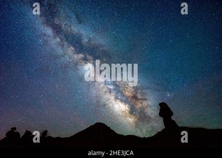 Milky Way with stone formations in the foreground at Goblin Valley State Park, Utah Stock Photo