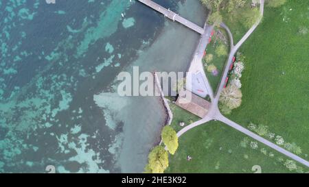 Top View of Lake Lucerne at Tribschenhorn Richard Wagner Museum Park in Central Switzerland with Boat House and Ship Dock Stock Photo