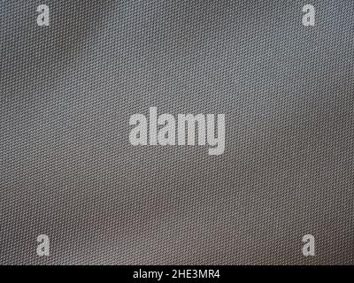 grey polyester fabric texture useful as a background Stock Photo